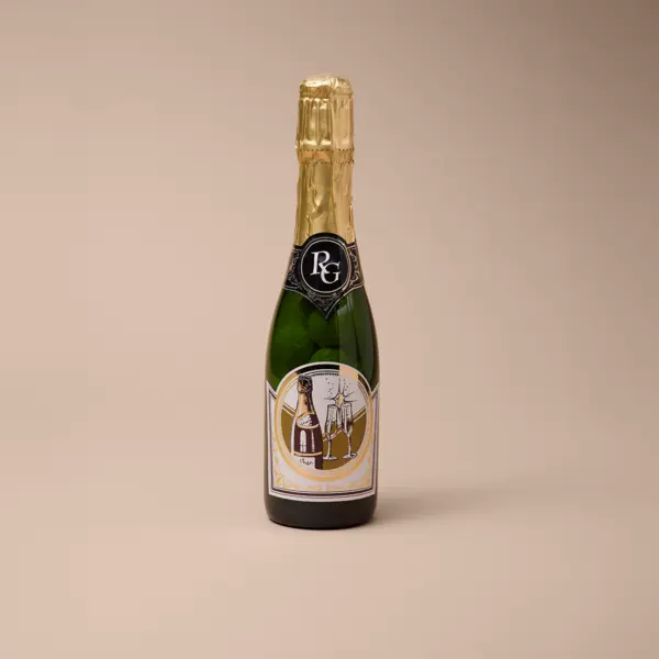 Champagnerflasche gefüllt mit Praliné, Champagner-Kugeln