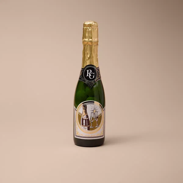 Champagnerflasche gefüllt mit Praliné, Champagner-Kugeln